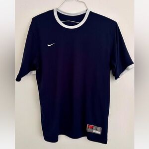 Nike Men's Navy Blue Dri Fit T-shirt with White Accents. Men’s Size Large.